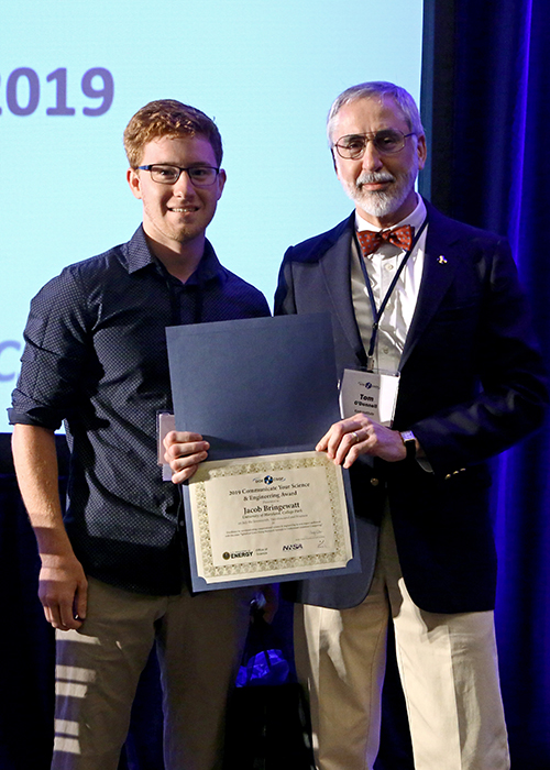 Krell's Thomas R. O'Donnell (right) presented Jacob Bringewatt with the 2019 CYSE Award.