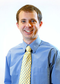 Headshot of Adam Cahill