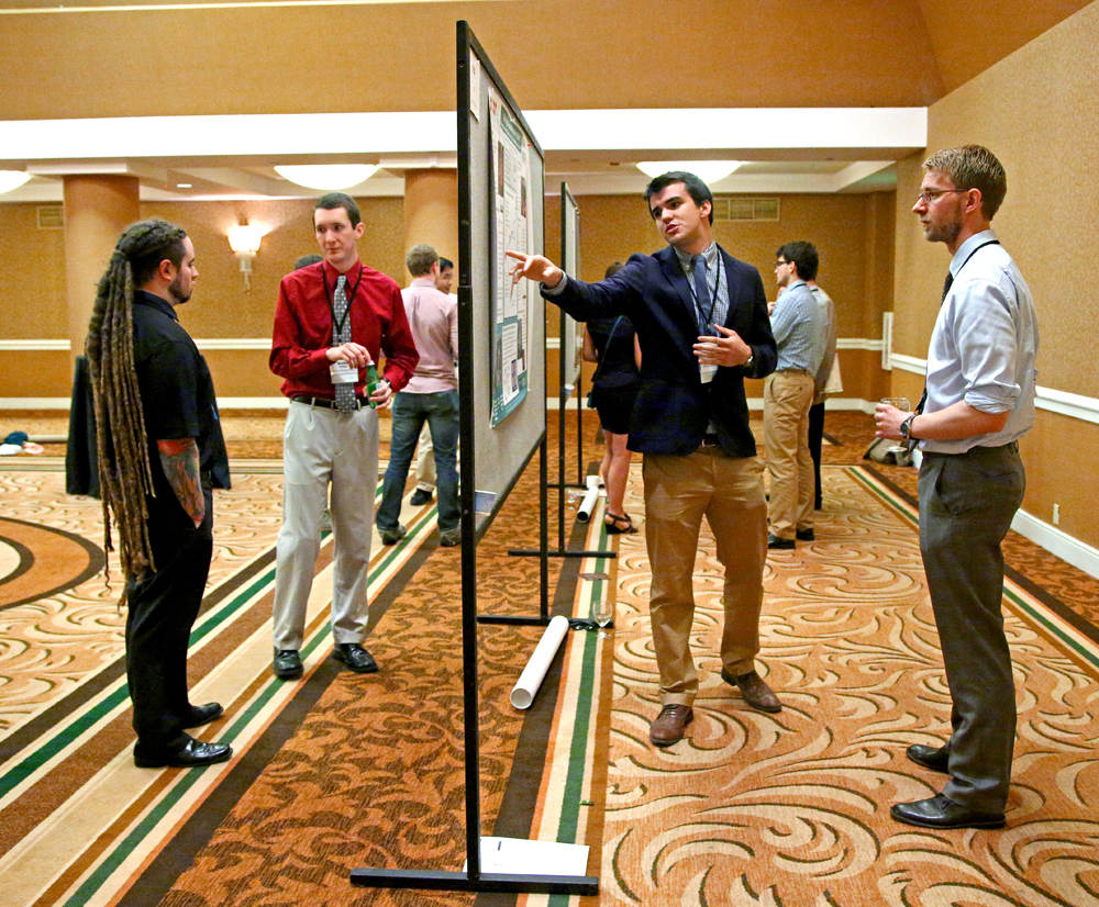 Fellows present their research at the annual poster session.