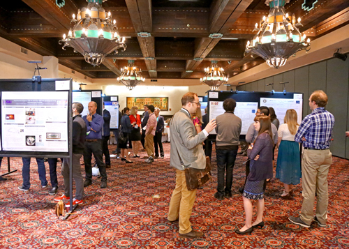 Fellows present their research at the annual poster session.