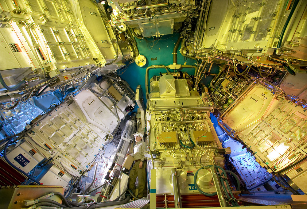 The National Ignition Facility's Final Optics Assemblies, shown here mounted on the lower hemisphere of the target chamber, contain special optics for beam conditioning, color conversion, and color separation (courtesy Lawrence Livermore).